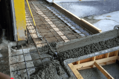 Commercial concrete pouring rebar | Hardscape Construction